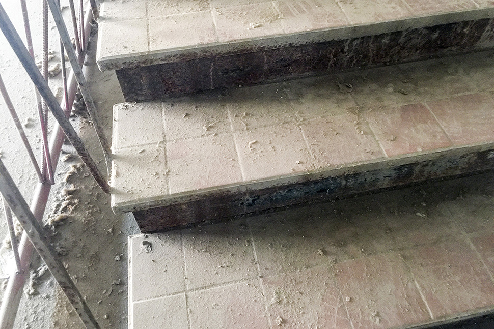 The stair tile remains in near-perfect condition. (Dallas Innovates staff photo)