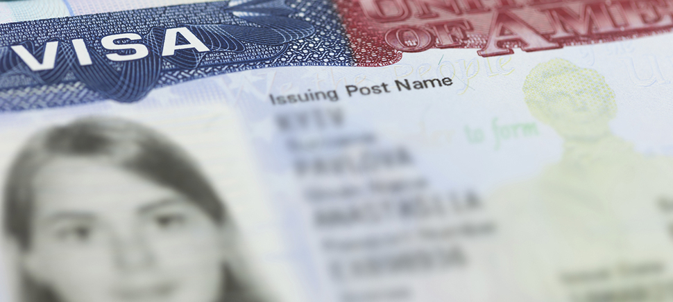 The American Visa in a passport page (USA) background.