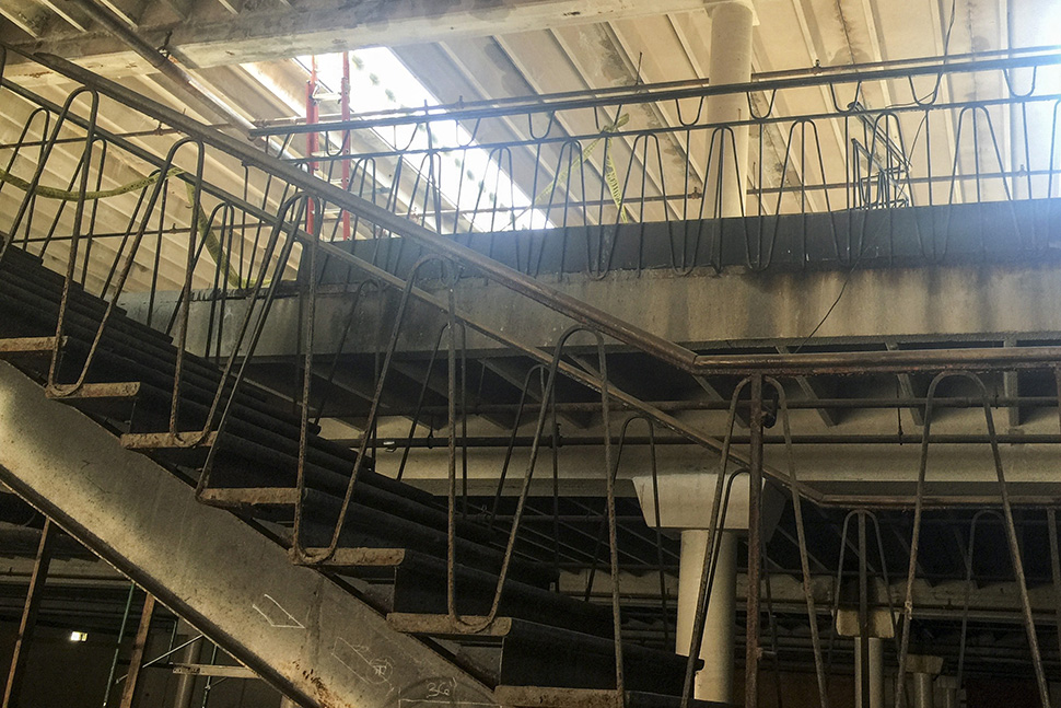 The original banisters will be restored by metal workers. (Dallas Innovates staff photo)