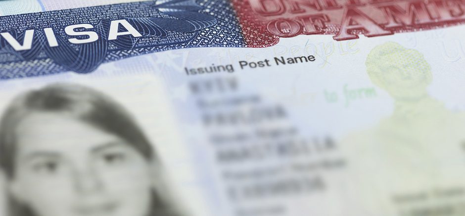 The American Visa in a passport page (USA) background.