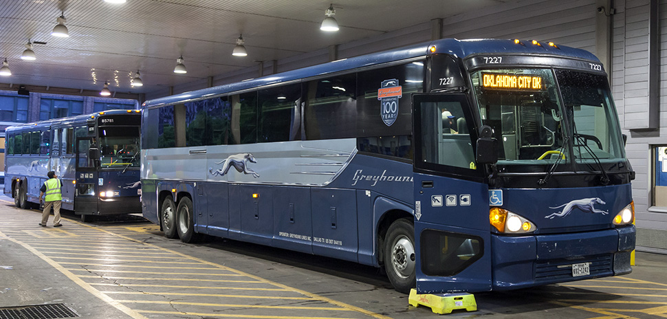 Greyhound buses at the terminal in downtown Dallas in April 2016. [Photo: typhoonski via istockphoto]