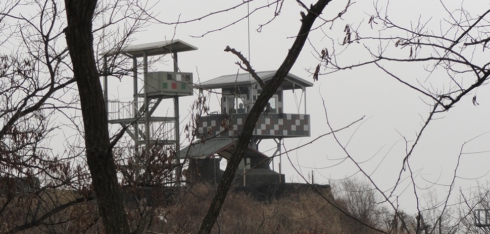 The DMZ (demilitarized zone) along the 38th parallel between North and South Korea, was created by agreement between North Korea, China, and the United Nations in 1953 and is guarded continuously.