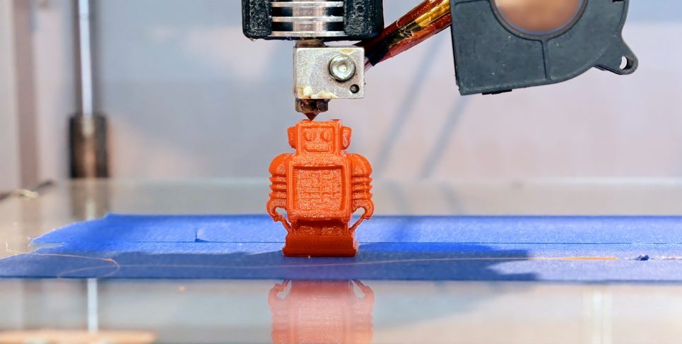 Automatic three dimensional 3d printer performs product creation. Modern 3D printing or additive manufacturing and robotic automation technology. Photo via istockphoto
