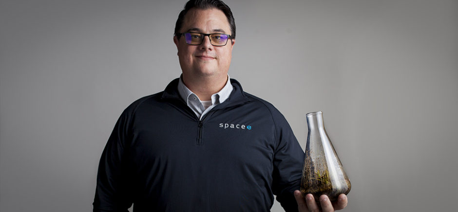 Skip Howard, CEO and Founder of Spacee, was photographed at Tyler Station in Dallas’ Oak Cliff. [Image, Skyler Fike; Carniverous plant, Texas Triffid Ranch]