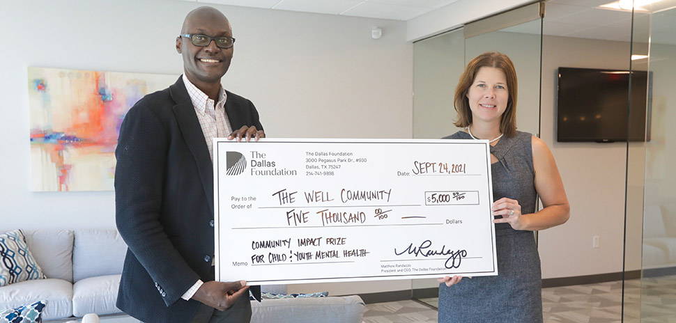 The Well Community, winner of the $5,000 Community Impact Prize for Child and Youth Mental Health (Medium Nonprofit), shown: Elizabeth Schorman, Treasurer, Board of Directors with Drexell Owusu, Chief Impact Officer, The Dallas Foundation [Photo: Jason Janik/The Dallas Foundation]