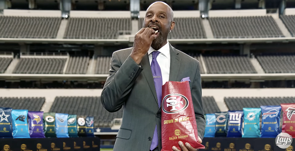 Jerry Rice tastes the hopefully bitter taste of 49ers branded chips. [Video still: Lay's]