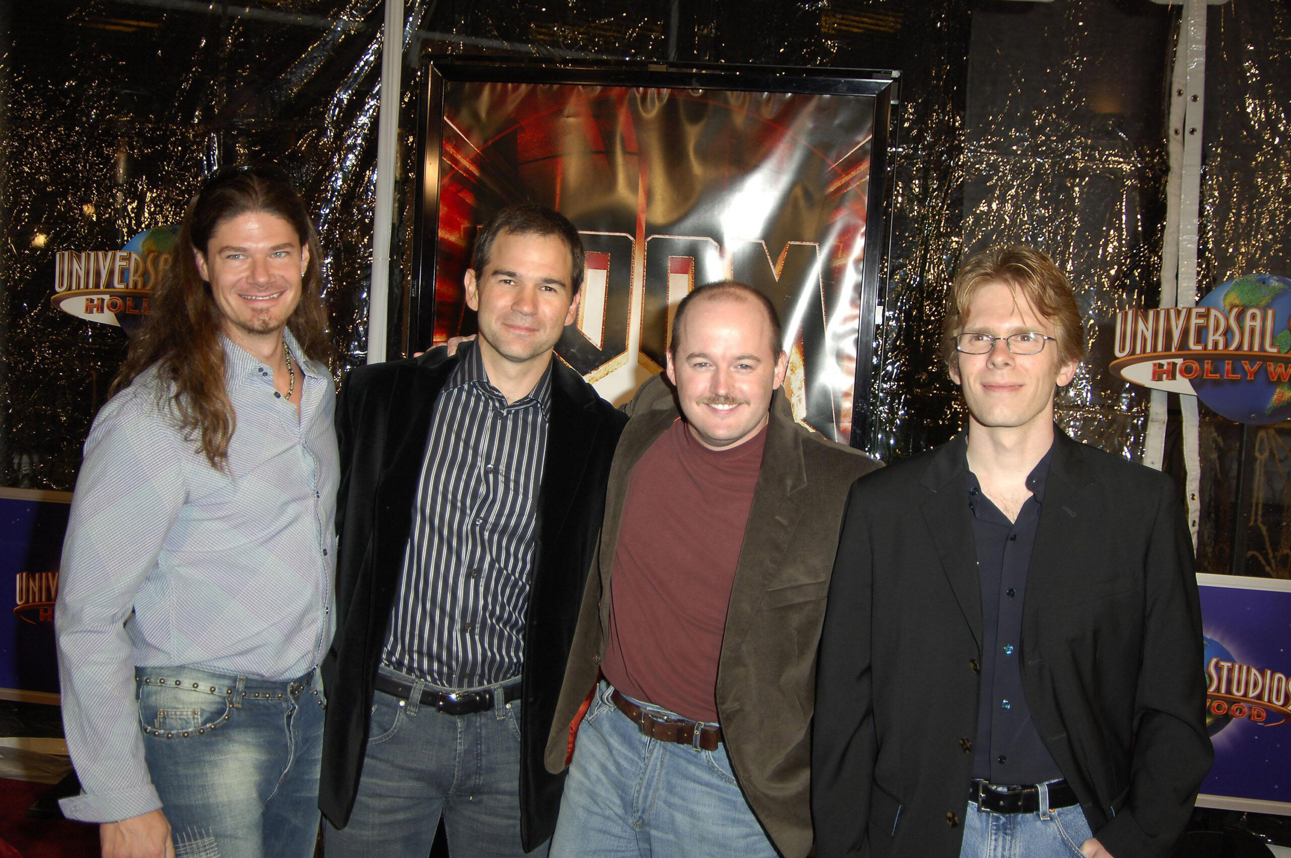 John Carmack, right, with Todd Hollenshead, Kevin Cloud, and Tim Willets at the DOOM Premiere at Universal Studios Cinema in LA in 2005. [Image: Shutterstock]