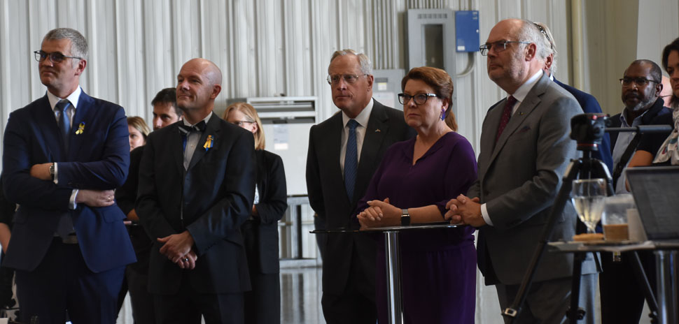 Ross Perot Jr., Estonia president Alar Karis, and first lady Sirje Karis look on with other invited guests as Cleveron CEO Sander Sebastian Agur talks about innovation, the future of transportation, and logistics.