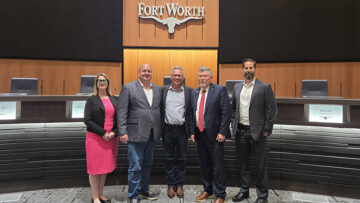 Motion carries: Kelly Baggett, Fort Worth Innovation Coordinator; District 10 Councilmember Alan Blaylock; John Lauer, Founder and CEO of Adom Industries; City Manager Jay Chapa; and Michael Hennig, Economic Development Manager, in chambers after Fort Worth City Council unanimously approved $15 million in incentives for Adom's $229 million cloud-connected electronics factory Tuesday night.
