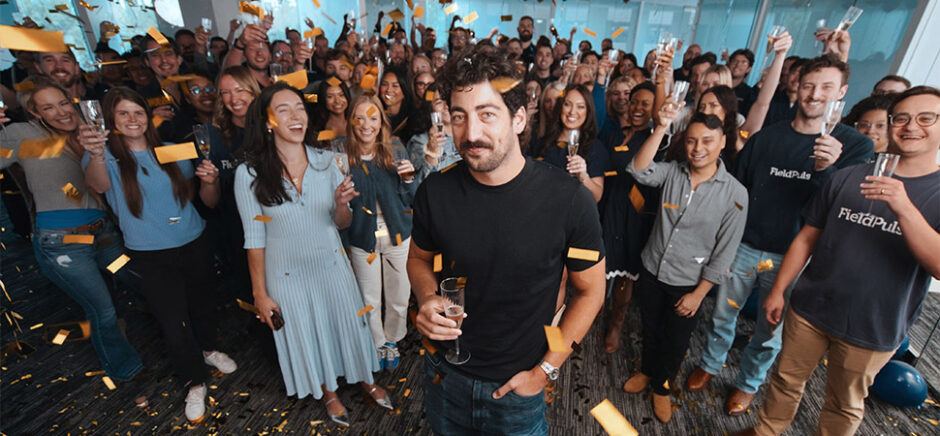 FieldPulse founder and CEO Gabe Pinchev (center) celebrates with his Dallas team after announcing the company’s $50 million Series C funding round, led by Fulcrum Equity Partners with Catalyst Investors joining as a new backer. [Photo: FieldPulse]