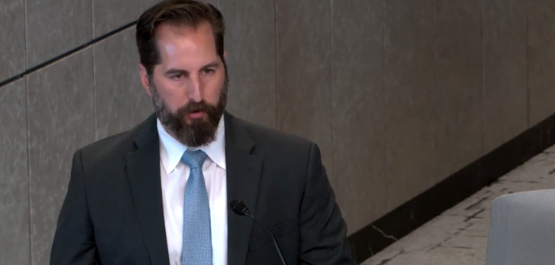 Michael Hennig, Fort Worth’s economic development manager, presents the Adom Industries proposal to the City Council in early August. The four-phase, $229 million project—code-named “Project Nimbus”—is up for a vote on Aug. 12, 2025. [Screenshot: City of Fort Worth video]