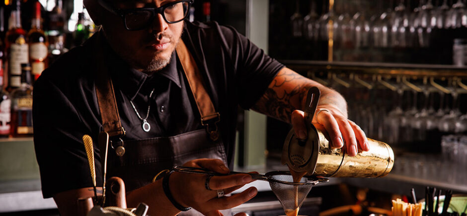 Shane Scully behind the bar. [Courtesy: Caché]