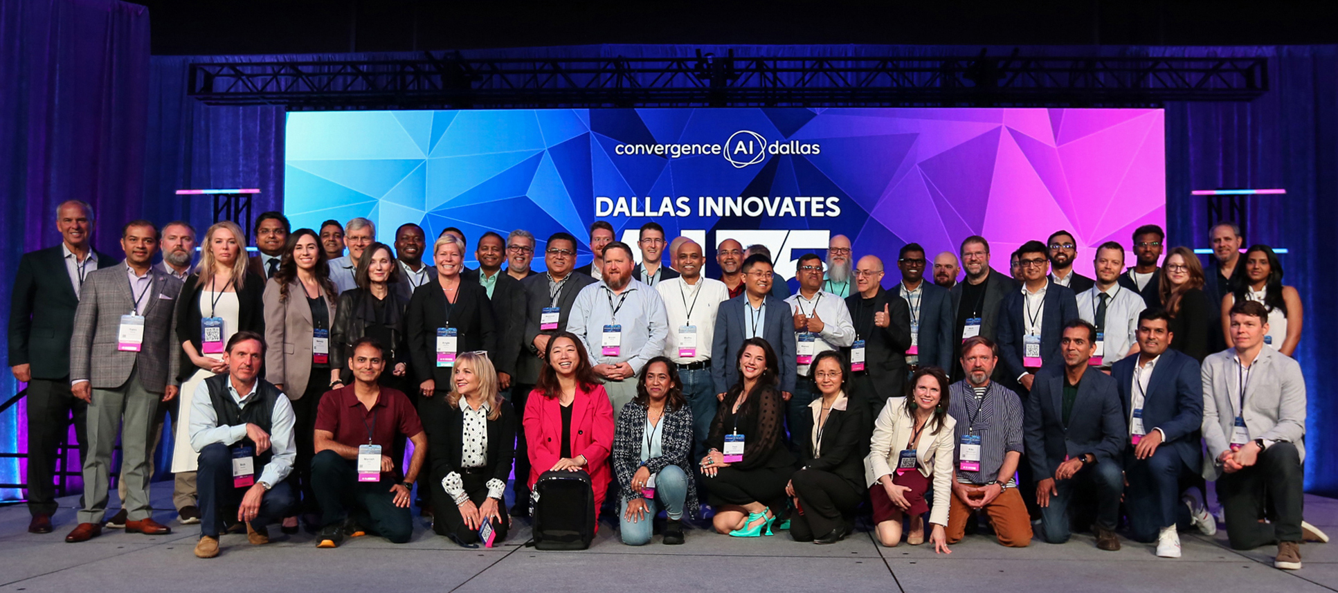 Many of the 2026 AI 75 honorees gathered onstage at Convergence AI Dallas in Irving with presenters Quincy Preston and Duane Dankesreiter. [Photo: Sandra Louz/DRC]
