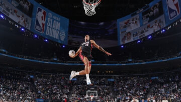 Keshad Johnson dunking basketball