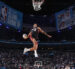 Keshad Johnson dunking basketball